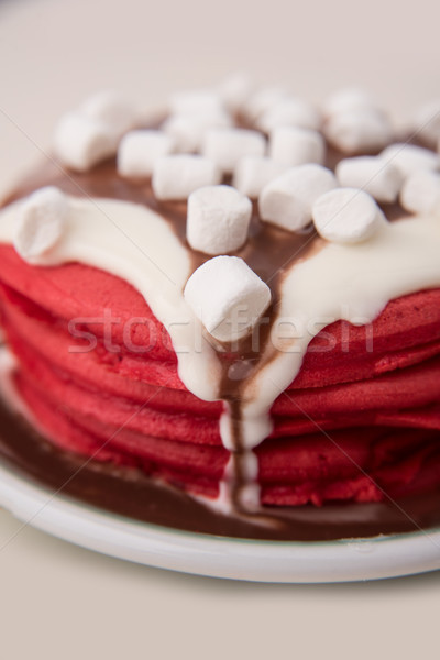 Shot of red pancakes in plate Stock photo © deandrobot