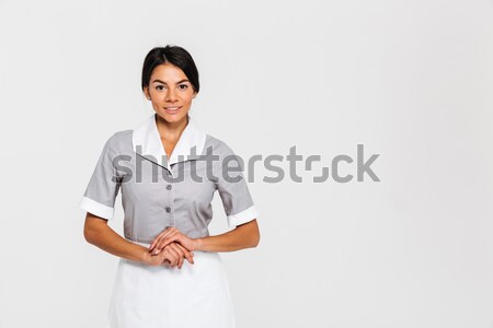 Brunette gouvernante mains ensemble stand [[stock_photo]] © deandrobot