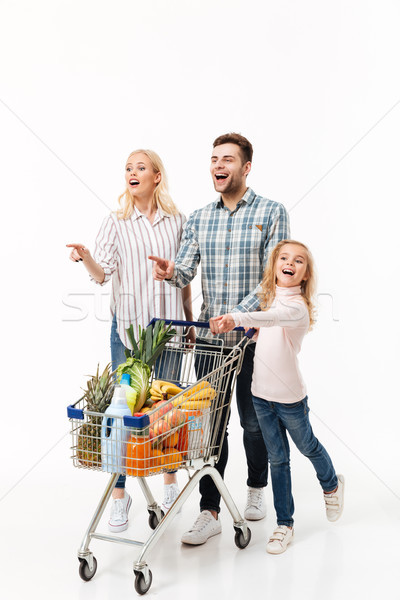Full length portrait of an excited family Stock photo © deandrobot