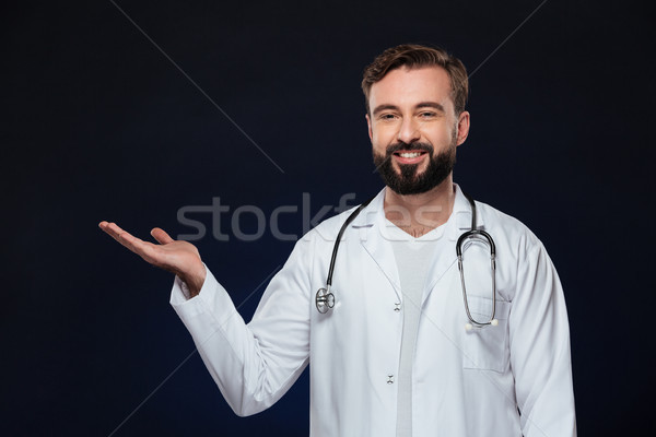 Portret vriendelijk mannelijke arts uniform stethoscoop Stockfoto © deandrobot