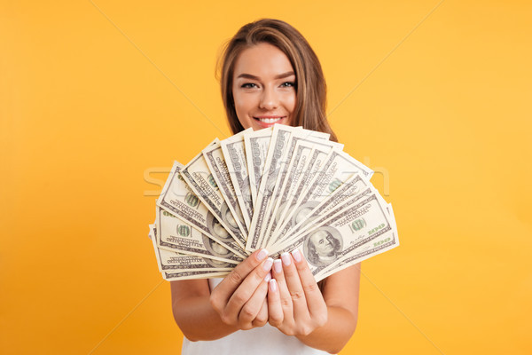 Portrait of a happy satisfied girl Stock photo © deandrobot