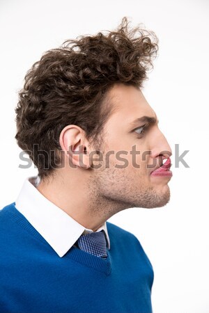 Portrait of fun man with tongue hanging out Stock photo © deandrobot