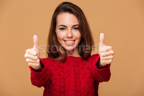 Caucasian lady with thumbs up Stock photo © deandrobot