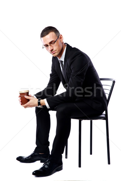 Сток-фото: задумчивый · бизнесмен · сидят · Кубок · кофе · белый