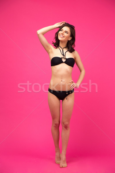 Uśmiechnięta kobieta strój kąpielowy portret różowy Zdjęcia stock © deandrobot