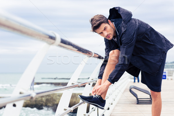 Portré sportok férfi nyakkendő cipőfűző reggel Stock fotó © deandrobot