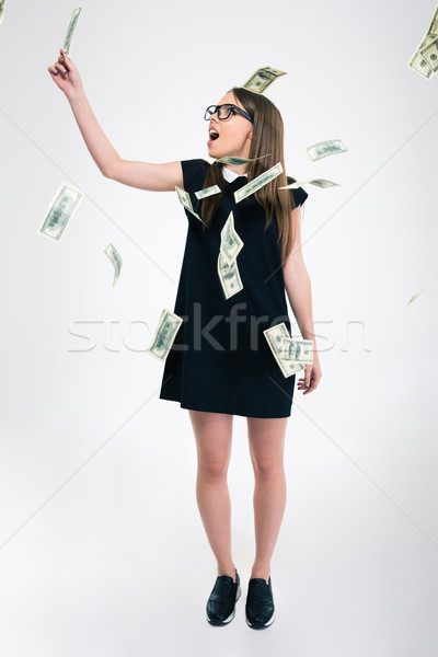 Cute standing under rain with dollar bills Stock photo © deandrobot
