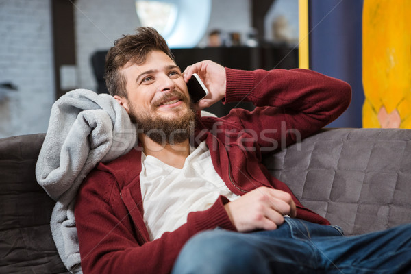 Sonriendo hablar teléfono móvil feliz guapo Foto stock © deandrobot