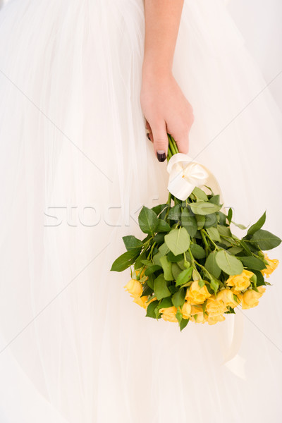 Bride holding wedding flowers Stock photo © deandrobot