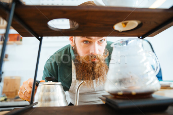 Man preparing coffee Stock photo © deandrobot