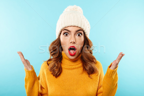 Close up portrait of a shocked pretty girl Stock photo © deandrobot