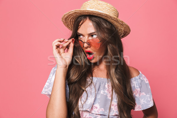 Portrait of a shocked young girl in summer clothes Stock photo © deandrobot