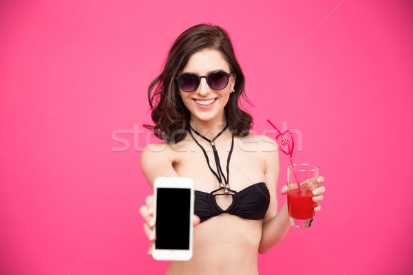 Uśmiechnięta kobieta szkła soku smartphone ekranu Zdjęcia stock © deandrobot