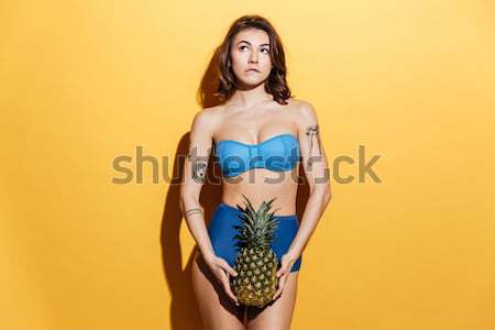 Jeunes souriant joli sexy girl ananas [[stock_photo]] © deandrobot