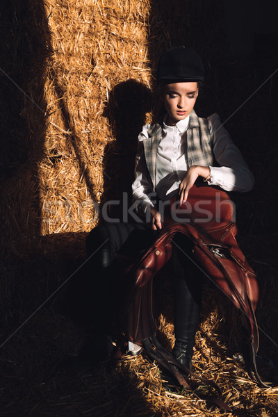 Sérieux jeune fille séance grange image regarder [[stock_photo]] © deandrobot