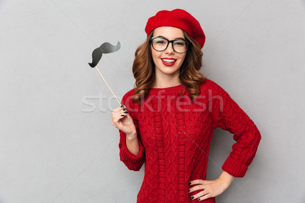 Ritratto donna sorridente rosso maglione Foto d'archivio © deandrobot