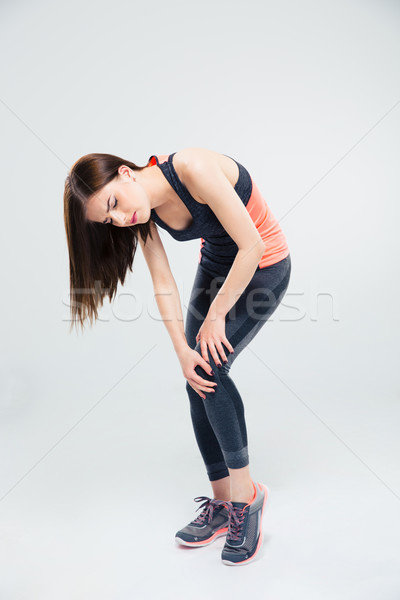體育 女子 疼痛 膝蓋 全長 肖像 商業照片 © deandrobot