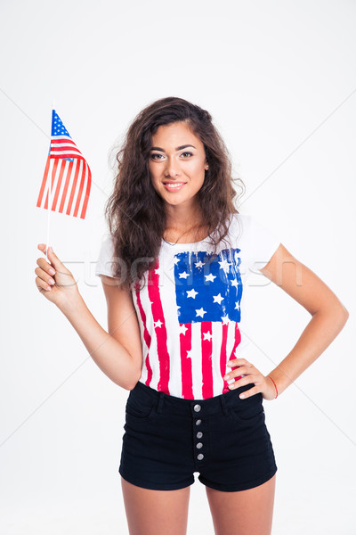 Sorridente bastante menina adolescente EUA bandeira Foto stock © deandrobot