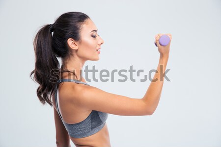 Fericit femeie de fitness gantere vedere laterala portret Imagine de stoc © deandrobot