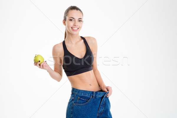 Grand jeans maigre pomme [[stock_photo]] © deandrobot