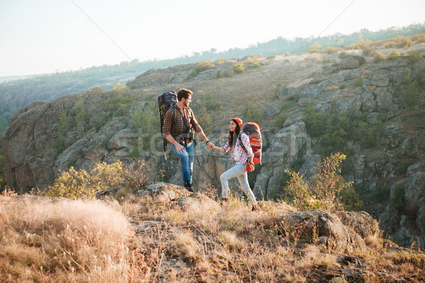 Traveler couple on Mountain road Stock photo © deandrobot