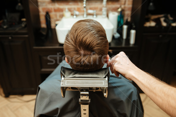 Schöner Mann Haarschnitt Friseur Sitzung Stuhl Haar Stock foto © deandrobot