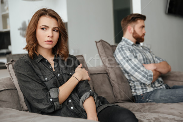 傷心 吵架 愛 情侶 坐在 沙發 商業照片 © deandrobot