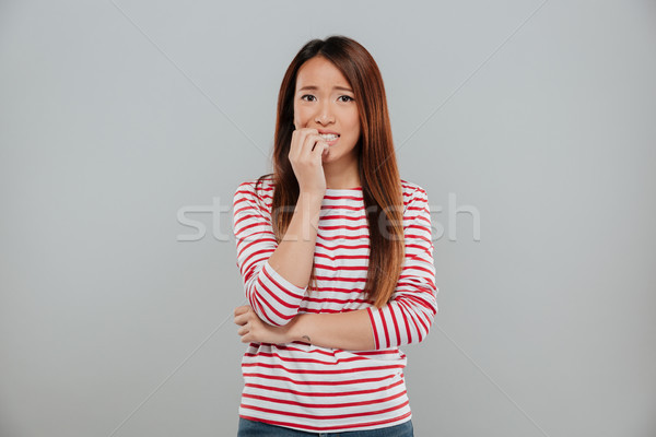 Portret nerveus asian meisje nagels Stockfoto © deandrobot