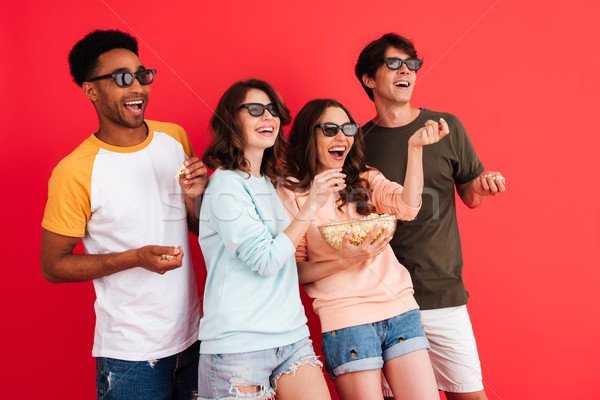 Portrait of a cheerful young group of multiracial friends Stock photo © deandrobot
