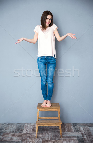 Stock photo: Woman with facial expression of surprise