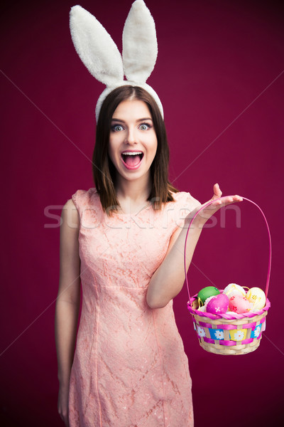Mulher ovo de páscoa cesta alegre mulher jovem coelho Foto stock © deandrobot