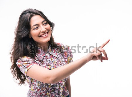 Smiling woman presenting copy space on her palm Stock photo © deandrobot