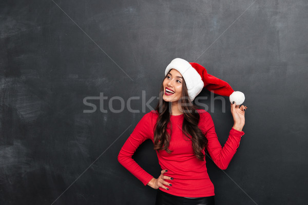 Feliz morena mujer rojo blusa Navidad Foto stock © deandrobot