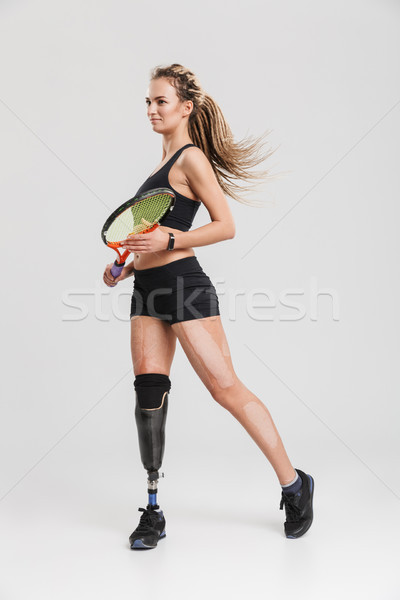 Strong young disabled sportswoman tennis player Stock photo © deandrobot