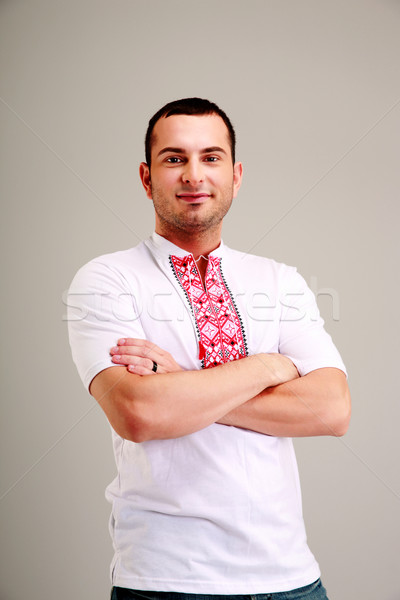 Portrait of happy man in the Ukrainian national clothes Stock photo © deandrobot