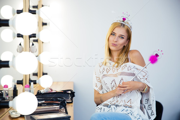 Cute woman with queen crown and magic wand Stock photo © deandrobot