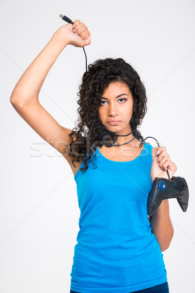 Portret trist fată joystick izolat Imagine de stoc © deandrobot