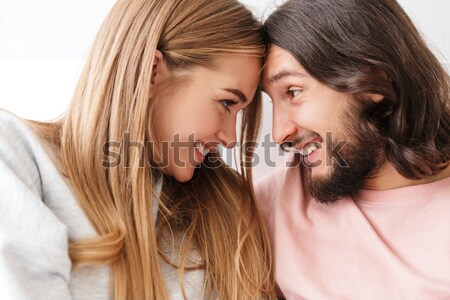 Beautiful tender couple hugging at home Stock photo © deandrobot