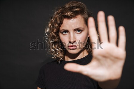 Young woman with fresh skin looking at camera Stock photo © deandrobot
