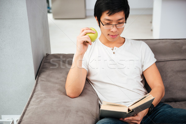 Stock photo: Asian man with book