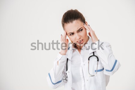 Nachdenklich jungen Krankenschwester Hand Stirn Stock foto © deandrobot