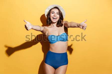 Mutlu genç kadın mayo fotoğraf çığlık atan kadın Stok fotoğraf © deandrobot