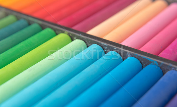 Close-up image of colorful chalk pastels in wooden box Stock photo © deandrobot