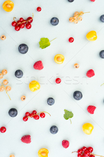 Berries isolated over white background table. Stock photo © deandrobot