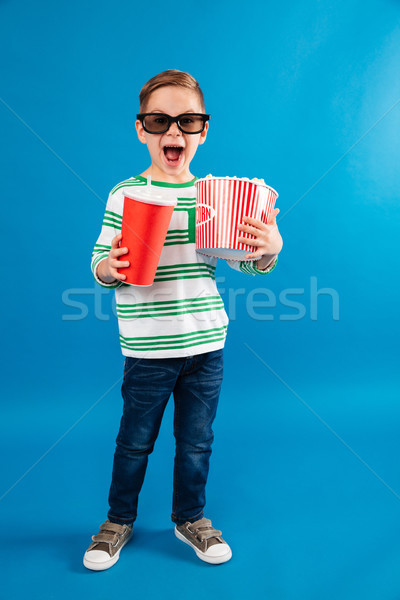 Teljes alakos kép boldog fiatal srác szemüveg óra Stock fotó © deandrobot