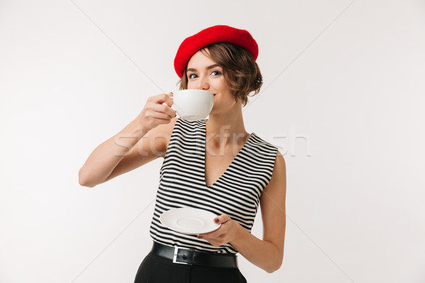 портрет красивая женщина красный берет питьевой Сток-фото © deandrobot