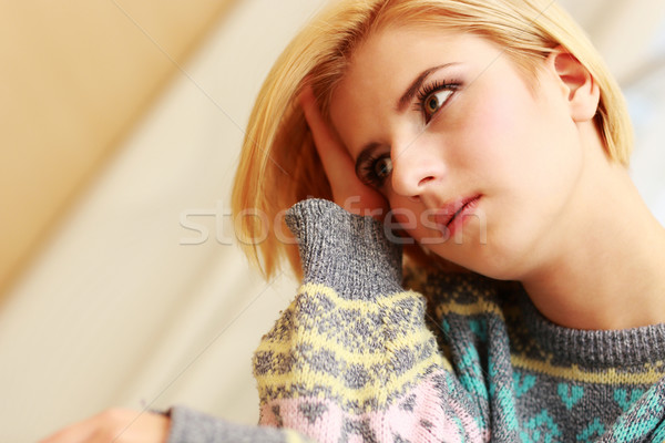 Young beautiful woman looking at copyspace Stock photo © deandrobot