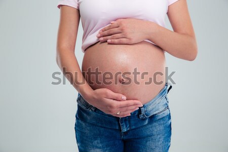 Closeup portrait of a pregnant woman Stock photo © deandrobot