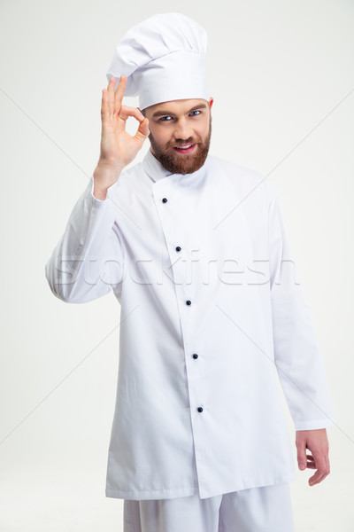 Male chef cook showing ok sign  Stock photo © deandrobot