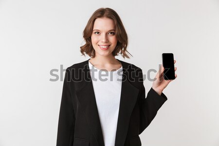 Happy fat woman in sportswear holding shaker Stock photo © deandrobot